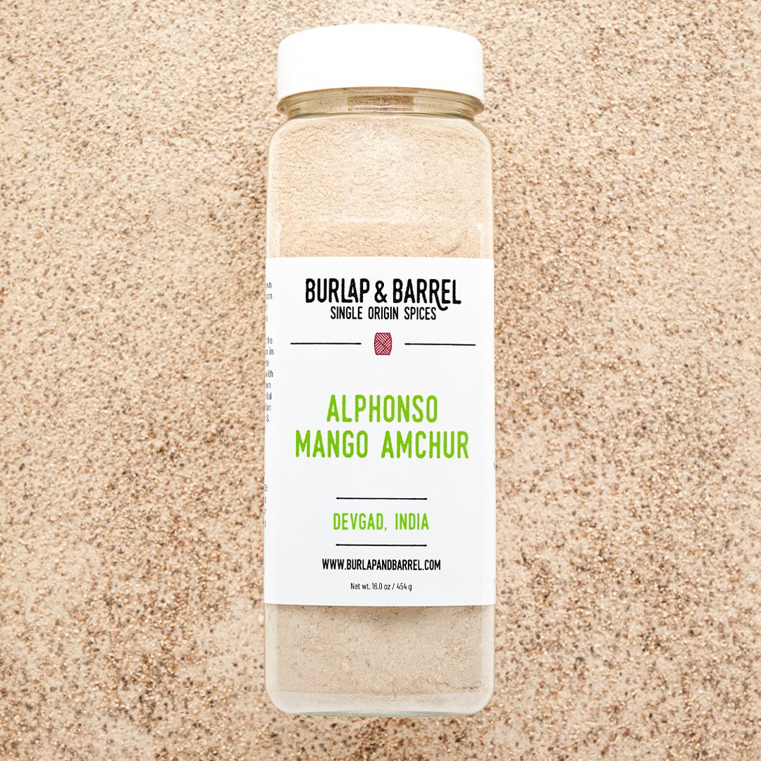 Burlap & Barrel Alphonso Mango Amchur spice jar containing tan powder from Devgad, India