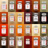 Grid of various spice jars with labels on a textured background