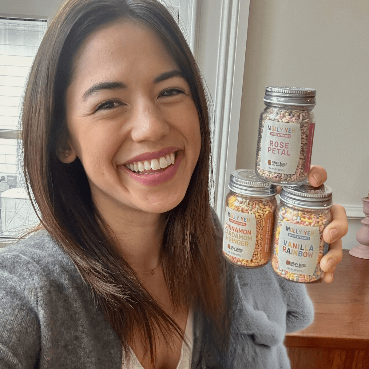 Molly Yeh hold spiced sprinkles