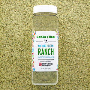 Bottle of Sohla + Ham Nothing Hidden Ranch seasoning from Burlap & Barrel on a textured beige background