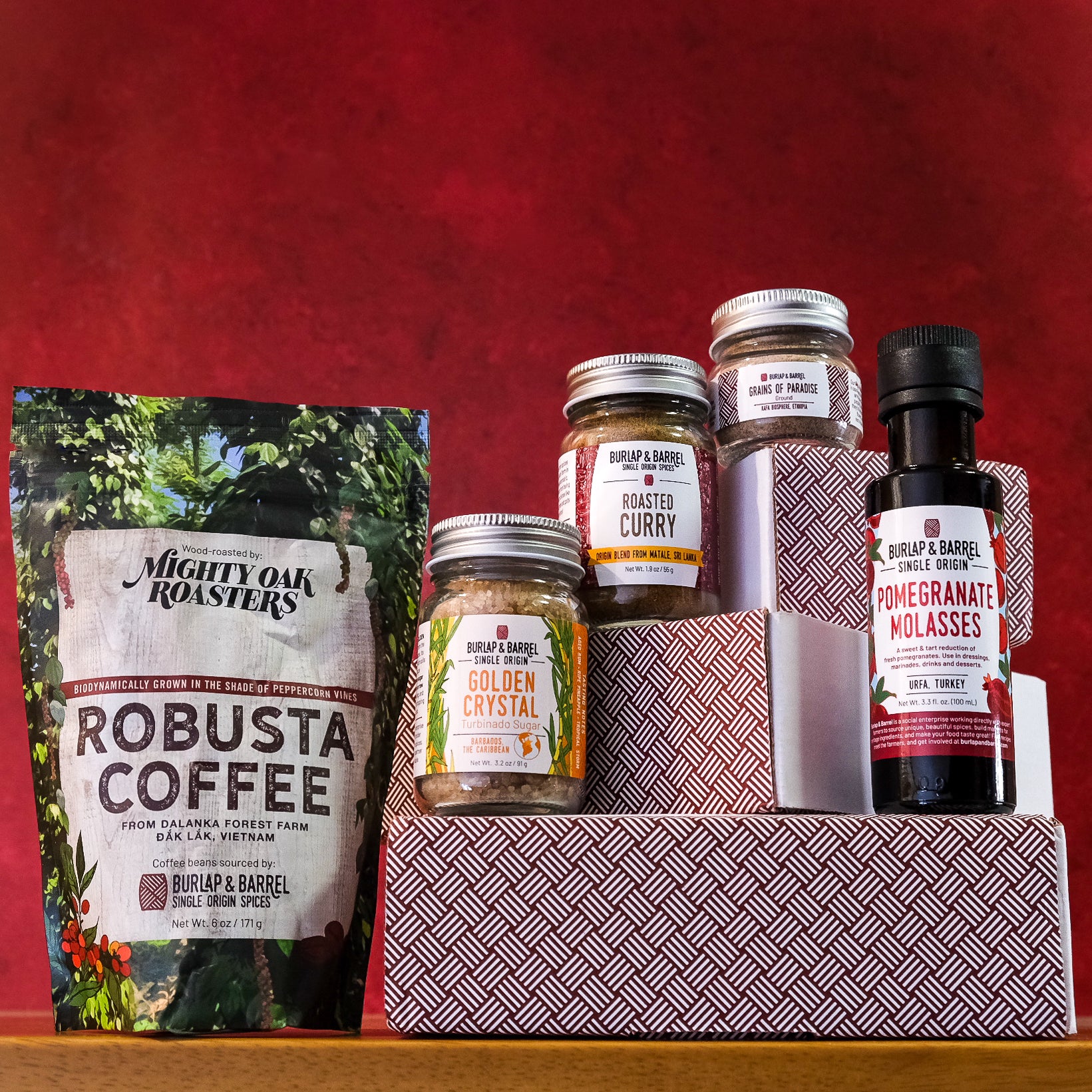 Burlap & Barrel Spice Club from February 2025. Robusta Coffee, Golden Crystal Sugar, Roasted Curry, Grains of Paradise, Pomegranate Molasses