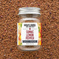 Jar of Burlap & Barrel Sumac Lemon Pepper on a textured brown background